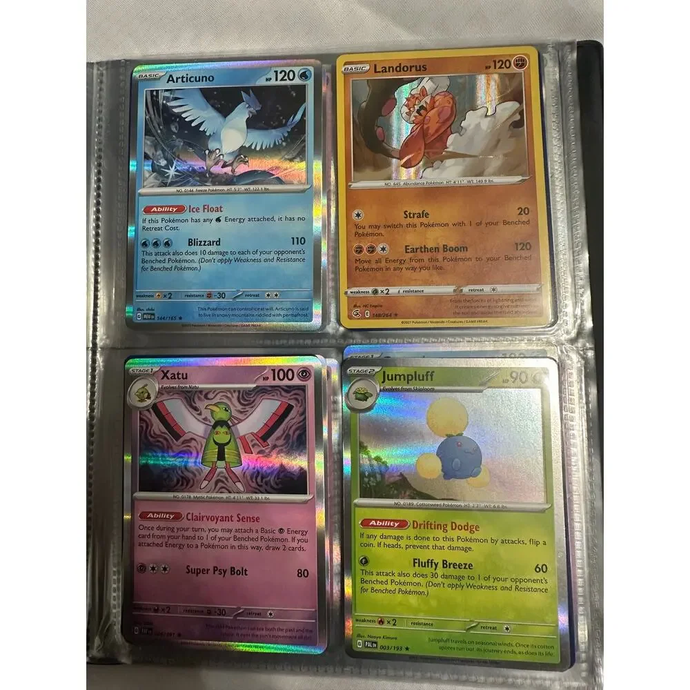 Lot of 80 holographic rare Pokemon cards.